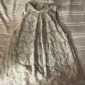 White lace sleeveless blouse